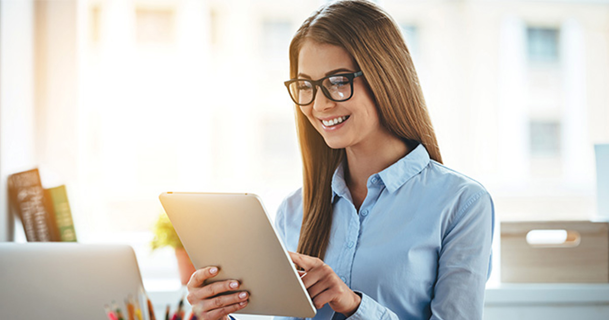 Woman giving digital signature in tablet